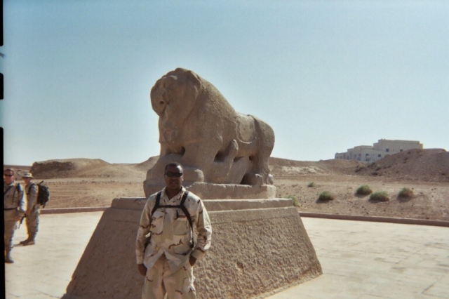 Ronald Drayton c/o 1978 in front of the Lion of Bablyon Iraq 2003
