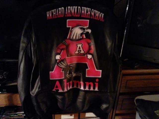 MY NAVY LEATHER JACKET W/ SCHOOL MASCOT ON BACK...Submitted by Anthony T. Smith c/o 1982